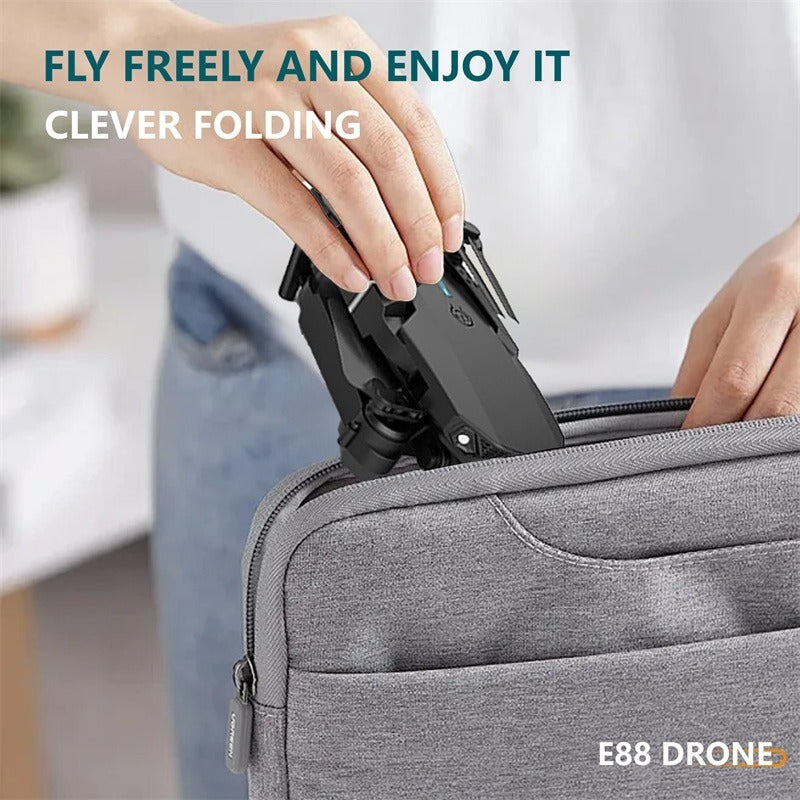The E88 Dual-camera Drone With Two Batteries Has The Function Of Altitude Hold Mode. It Is Equipped With Dual Lenses And Can Fly Stably. - Mountain ship