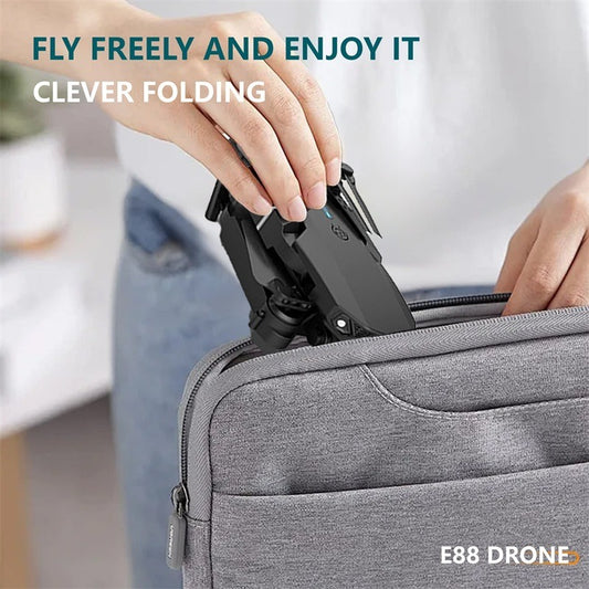 The E88 Dual-camera Drone With Two Batteries Has The Function Of Altitude Hold Mode. It Is Equipped With Dual Lenses And Can Fly Stably. - Mountain ship